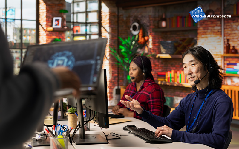 Customer service agents in an open office setting.