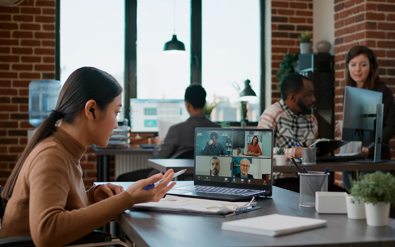 Student participating in a hybrid virtual classroom video call.